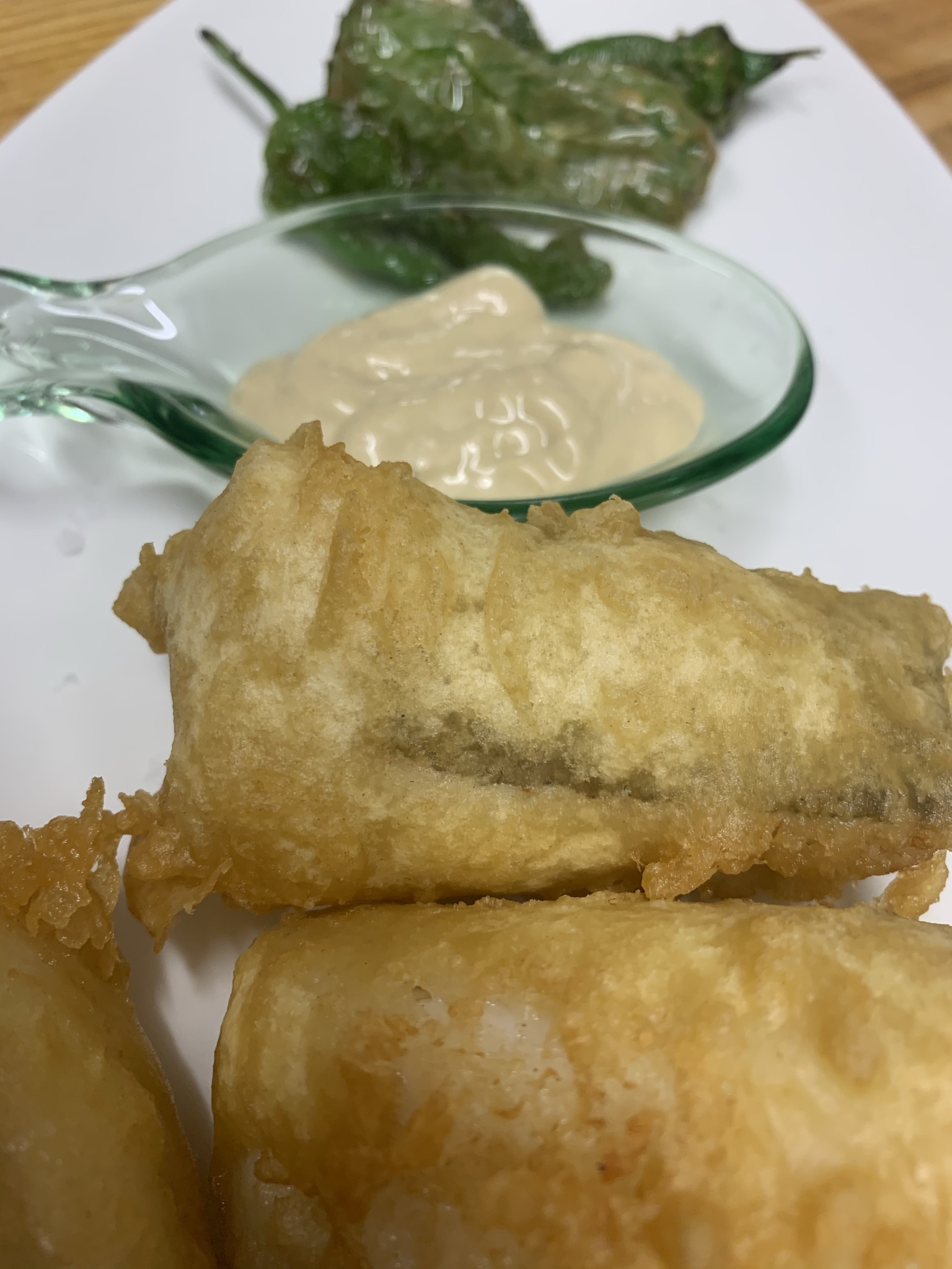 Lomitos de Bacalao con Ali oli de ajo negro